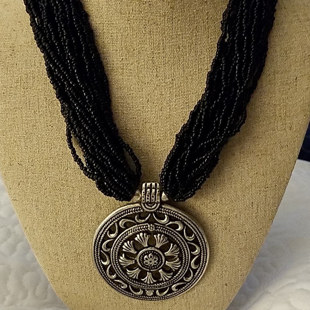 GUC Black bead strands with Silver Medallion